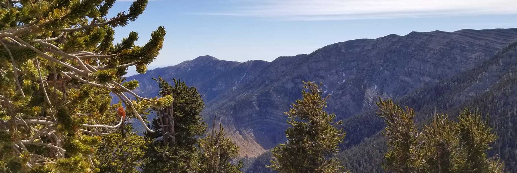 Griffith Peak as Point of Reference While Descending Lee Peak in Kyle Canyon, Spring Mountains, Nevada Slide 001