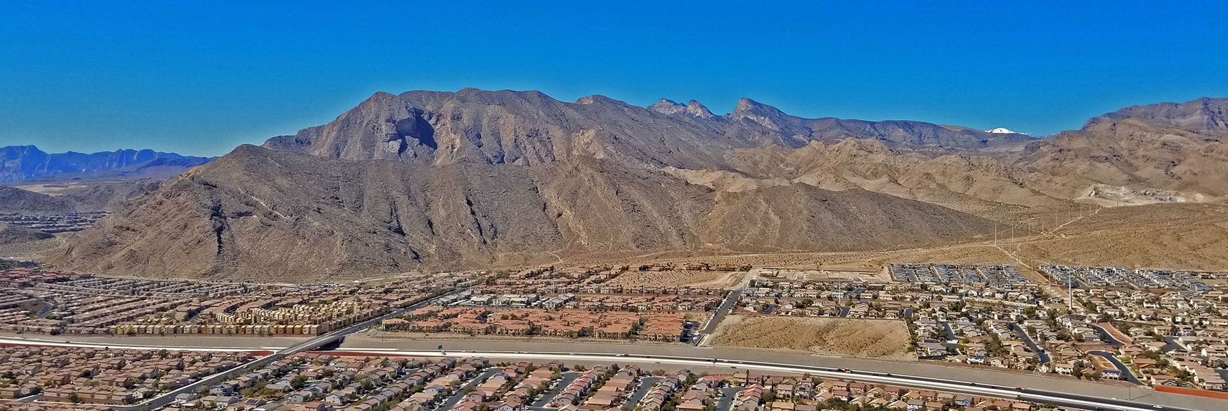 Northwestern View: La Madre Mountains Wilderness. Snow Capped Tip of Charleston Peak | Lone Mountain | Las Vegas, Nevada