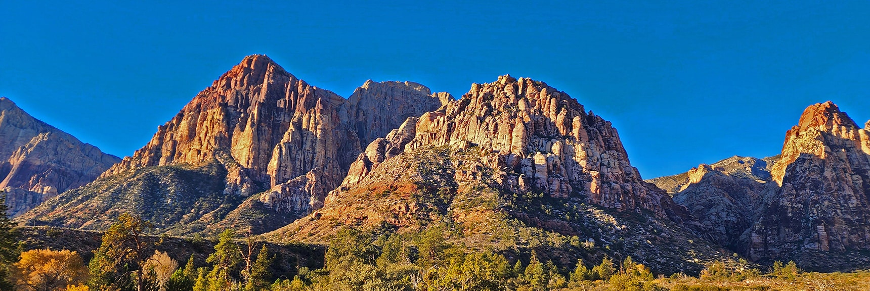 Rainbow Mountain (left), Juniper Peak (right) Juniper Canyon (between) | Rainbow Mountain Eastern Cliffs Rock Climbers | Rainbow Mountain Wilderness, Nevada