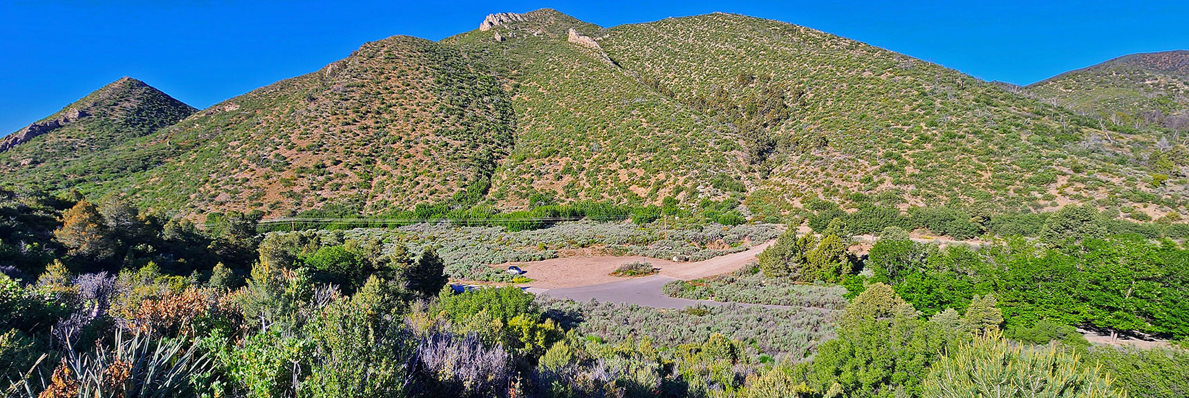 View from Approach Ridge Down to Start Point Parking Area. | Wilson Ridge South High Point | Lovell Canyon, Nevada