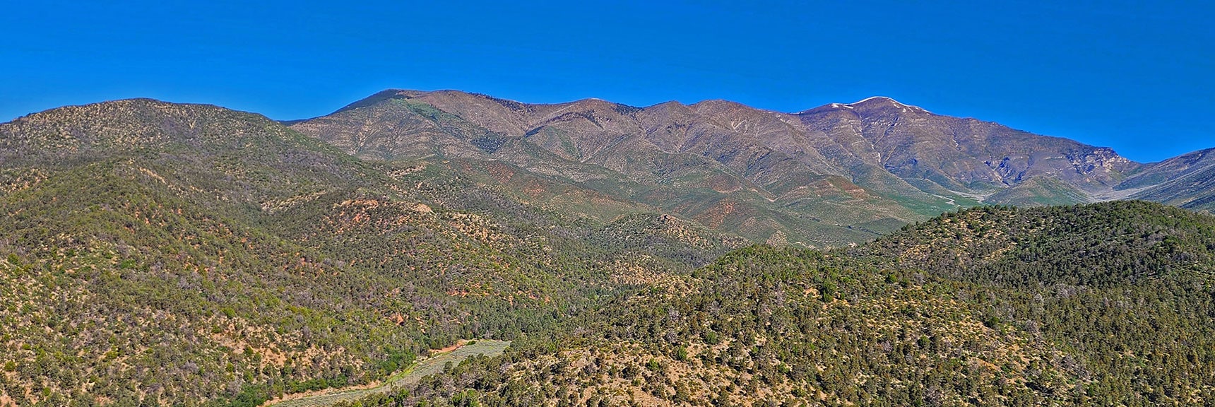 Sexton Ridge Leading to Snow-Capped Griffith Peak. Handy Peak Below. | Wilson Ridge South High Point | Lovell Canyon, Nevada