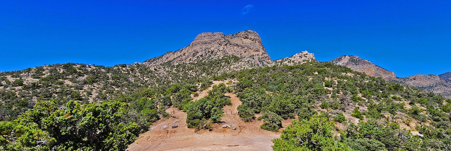 Arrival at Bridge Mt. Trailhead. Note High Red Rock Summit and Lower White Bluff to the Right. | Rocky Gap Rd to Bridge Mt Trailhead | Lovell Canyon, Nevada
