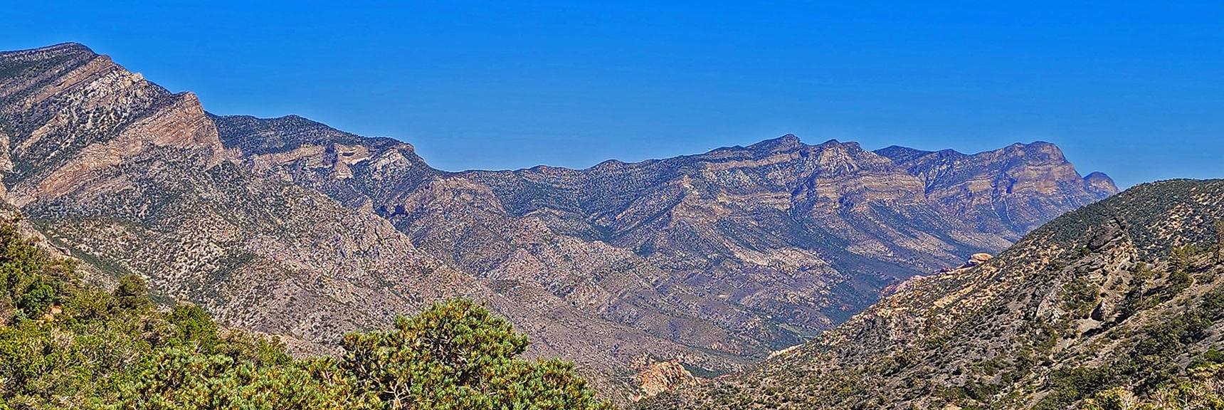 Further to the Right is the La Madre Mts. Cliff Line Above Red Rock Canyon | Rocky Gap Rd to Bridge Mt Trailhead | Lovell Canyon, Nevada