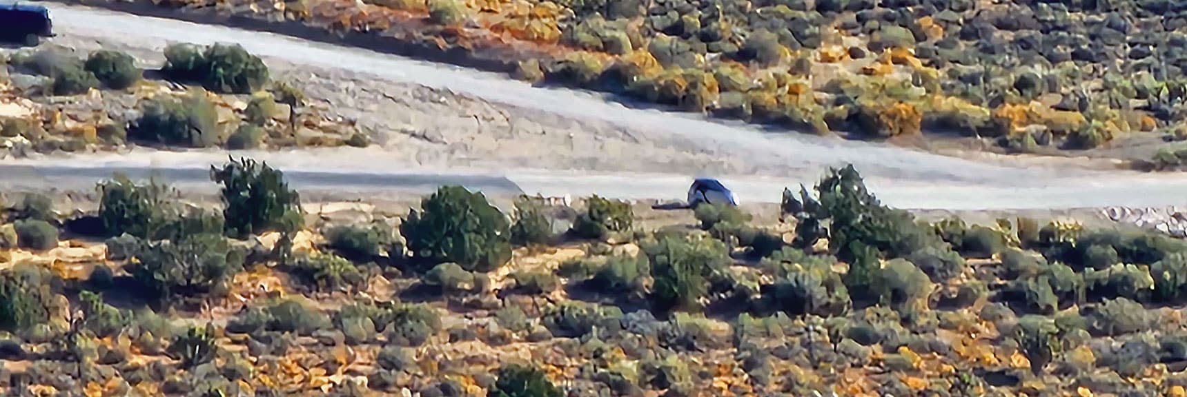 View Straight Down to "The Beast" Parked Below at Starting Point. | Landmark Bluff Summit | Lovell Canyon, Nevada