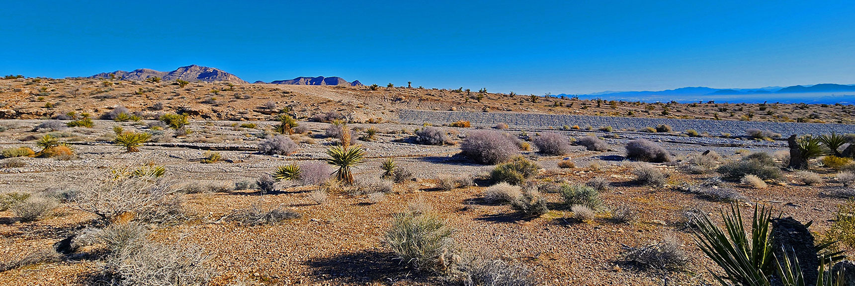 Take a Left Here onto Brownstone Road. Road Over Next Ridge Goes to Little Red Rock. | Brownstone Trail | Calico Basin | Brownstone Basin | La Madre Mountains Wilderness, Nevada