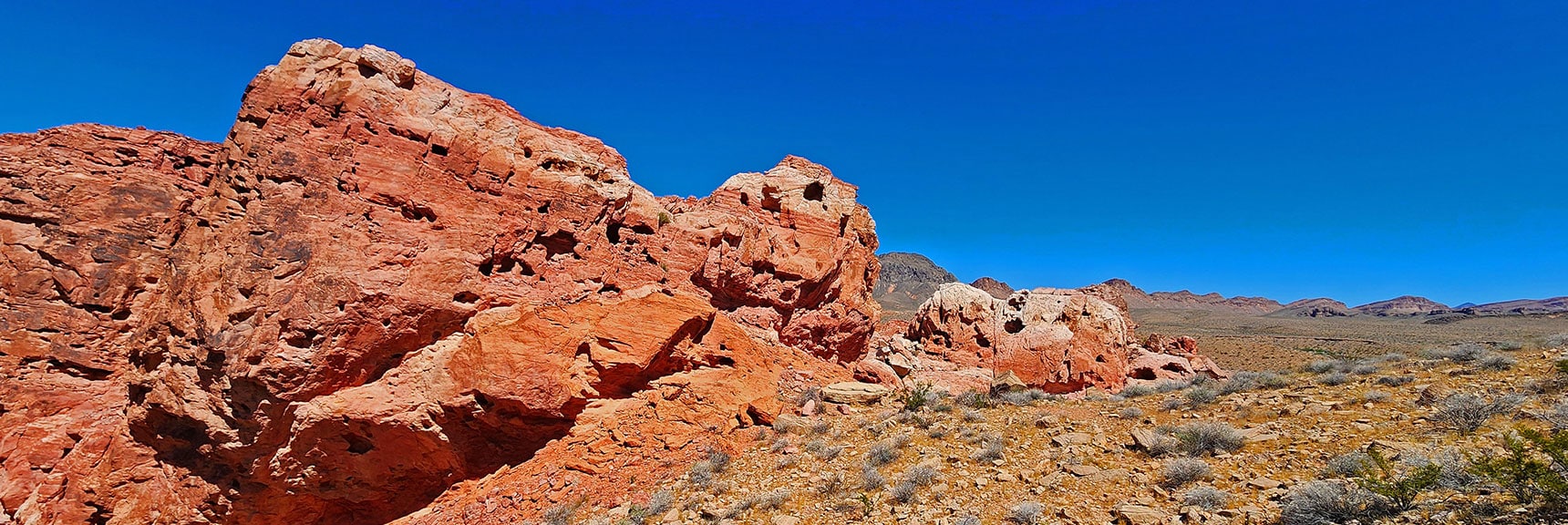 Round the Right Edge of Cliffs. Sculpted Jurassic Sandstone Formations Begin. | Northern Bowl of Fire Detailed View | Lake Mead National Recreation Area, Nevada