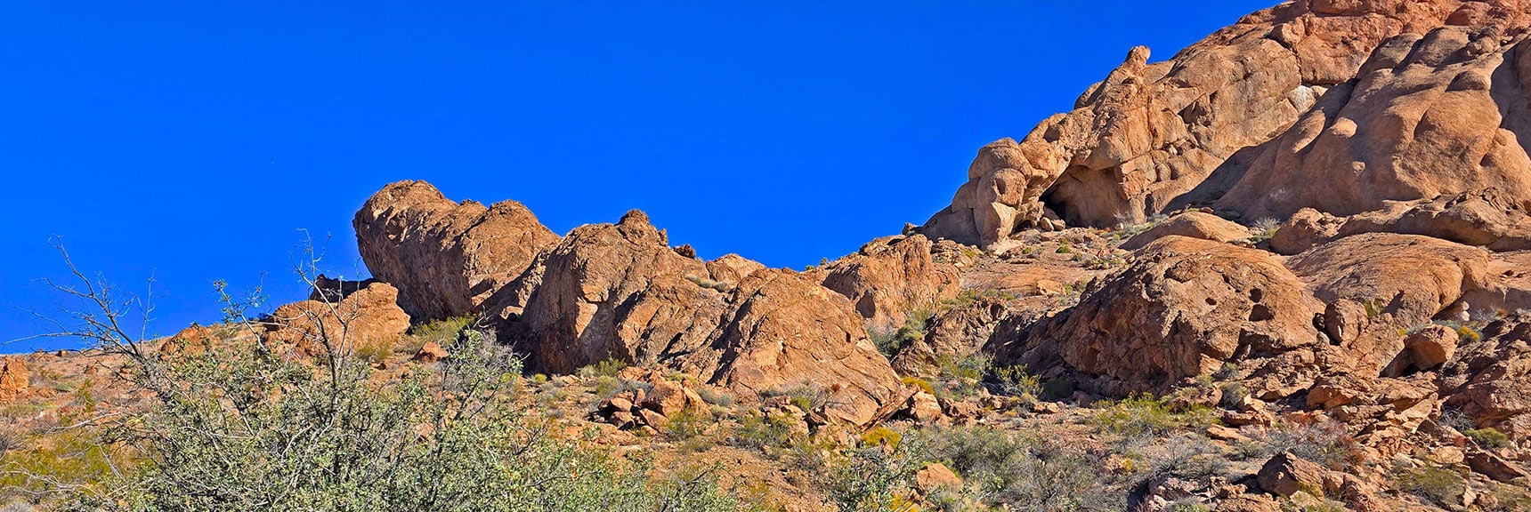Short Ascent Back Up Wash to Arrive Below Arch Cave. Approach from Left. | Murl Emery Arch | Eldorado Wilderness, Nevada