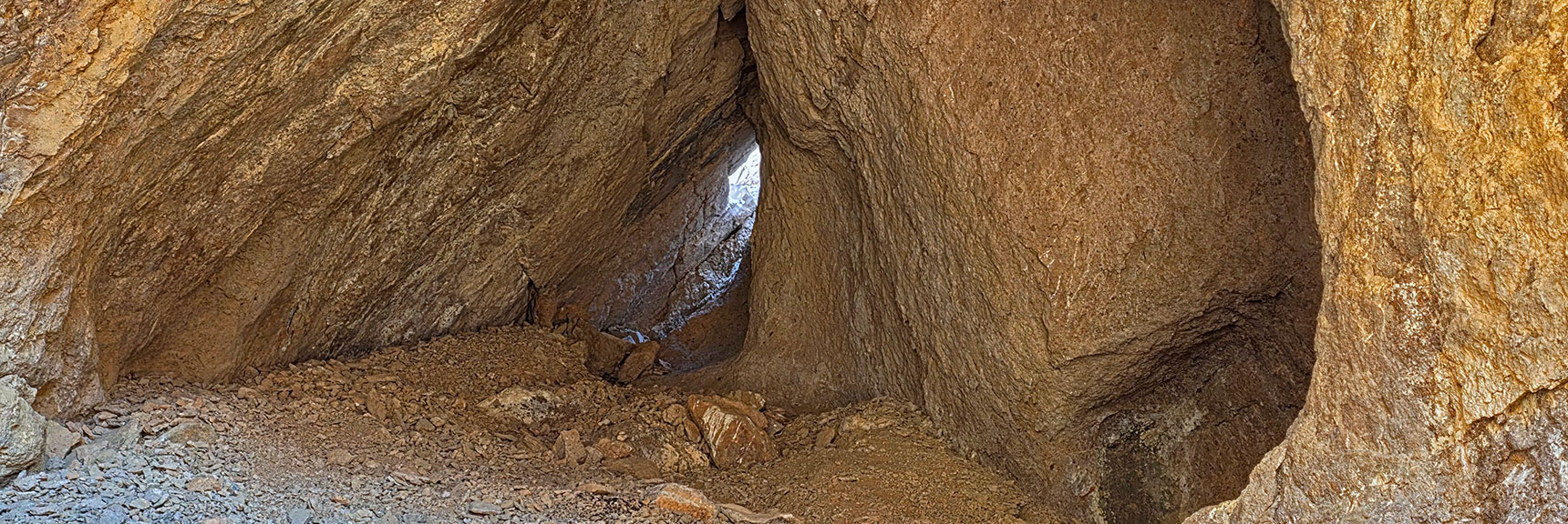The Upper Opening is a Small Rabbit Hole, Just Wide Enough to Exit. | Murl Emery Arch | Eldorado Wilderness, Nevada