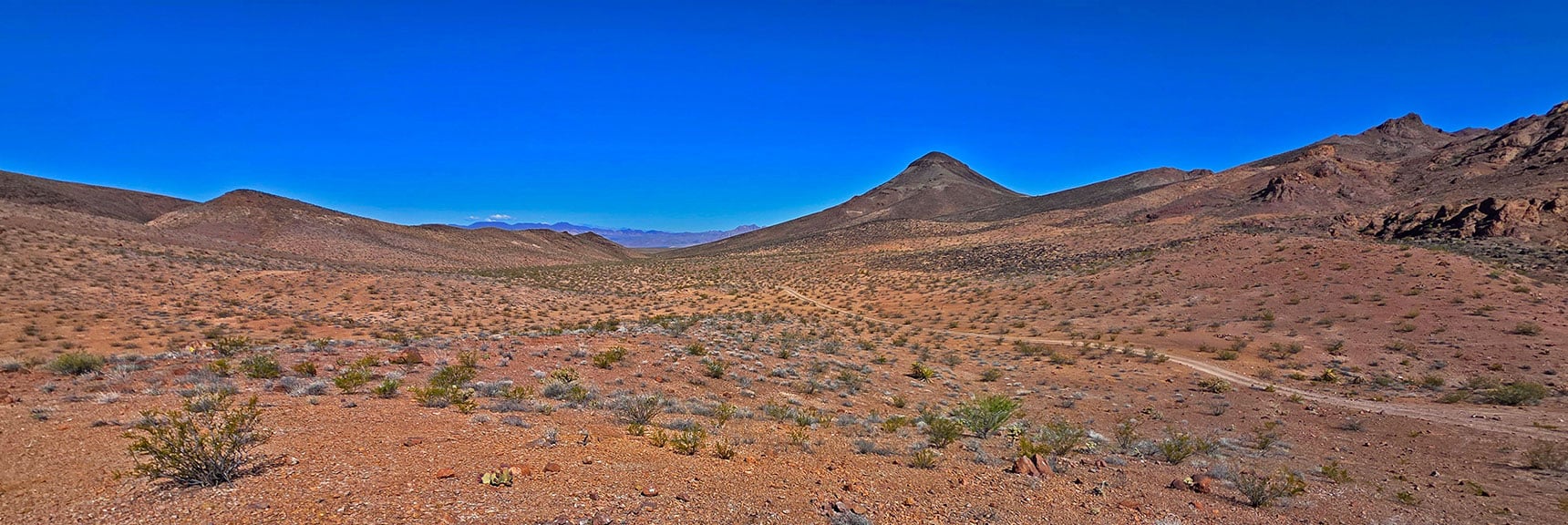 View Back Down Road F Toward Pilot Cone, Boulder City | Forlorn Hope Peak South and Peak 2720 West, Eldorado Wilderness, Nevada