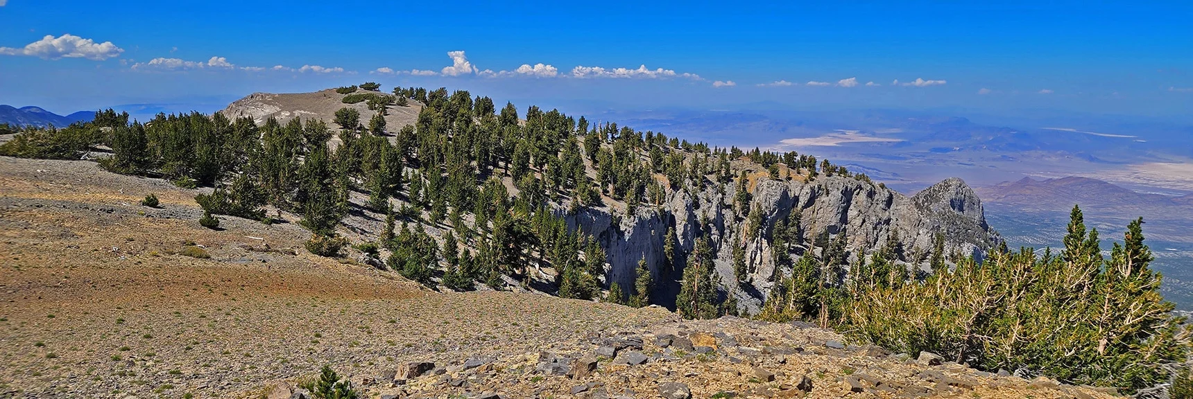 The Northeastern Cliffs Descent Route Skirts the Base of the Cliffs Ahead | Mummy Mountain Grand Crossing | Lee Canyon to Deer Creek Road | Mt Charleston Wilderness | Spring Mountains, Nevada |
