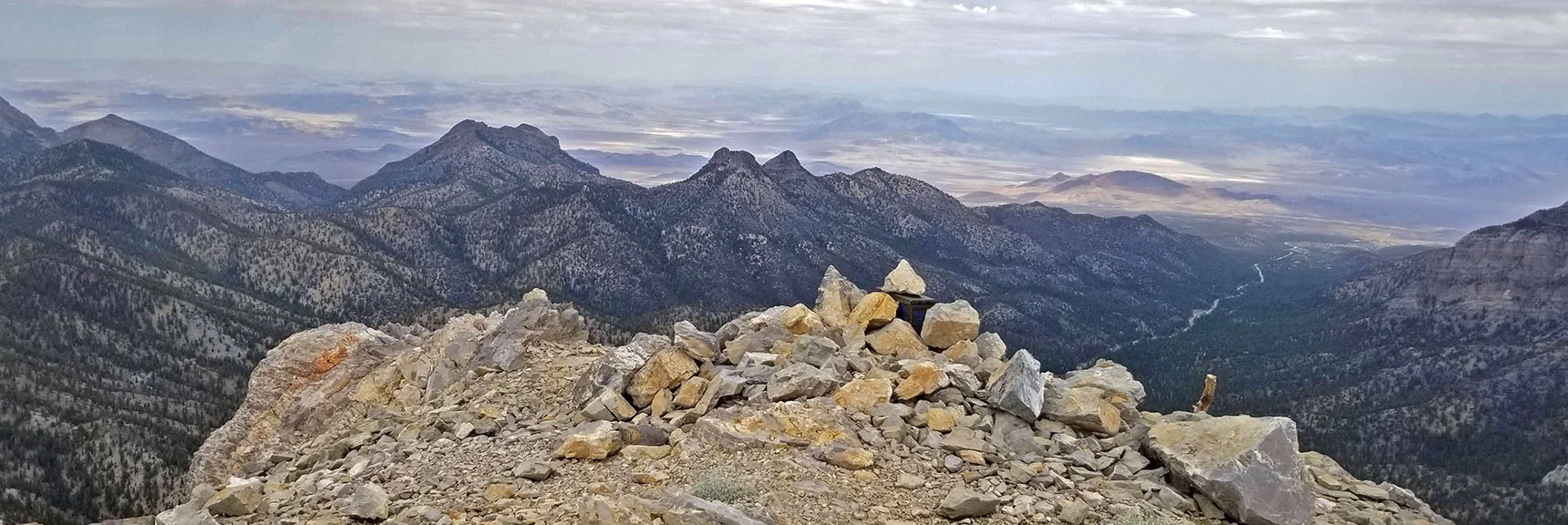 Arrival on Lee Peak Summit. View Down Lee Canyon | Lee and Charleston Peaks via Lee Canyon Mid Ridge | Mt Charleston Wilderness | Spring Mountains, Nevada
