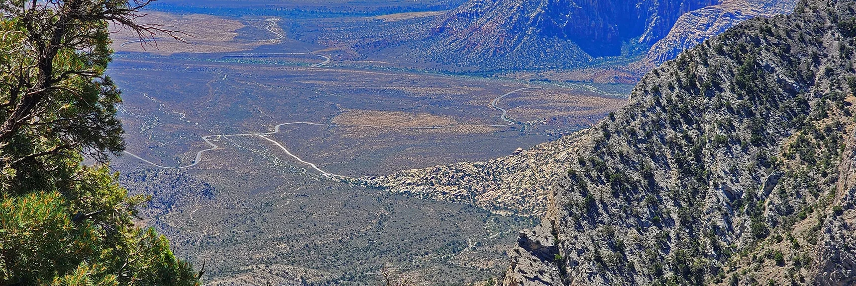 Red Rock Park Scenic Drive and Tip of White Rock Mt. Below. Potential Approach/Descent Route | Kyle Canyon Grand Crossing | Northern Half | La Madre Mountains Wilderness, Nevada