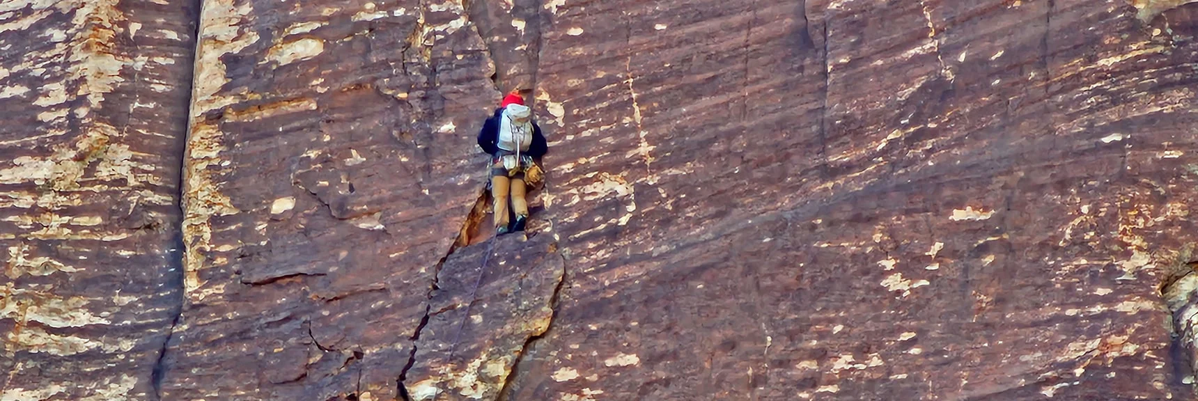 Resting on a Very Narrow, High Ledge | Rainbow Mountain Eastern Cliffs Rock Climbers | Rainbow Mountain Wilderness, Nevada