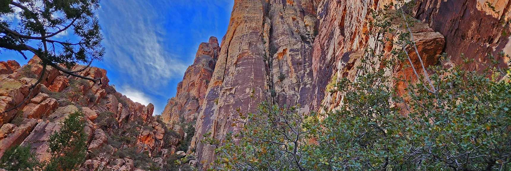 Large View of Rainbow Mountain's Spectacular Pillar-Like Eastern Cliffs | Rainbow Mountain Eastern Cliffs Rock Climbers | Rainbow Mountain Wilderness, Nevada