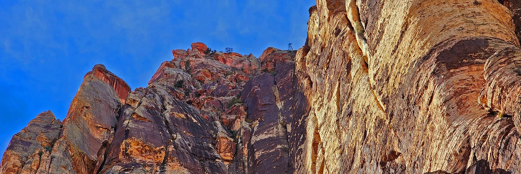 Zooming in on Rainbow Mountain's Summit | Rainbow Mountain Eastern Cliffs Rock Climbers | Rainbow Mountain Wilderness, Nevada