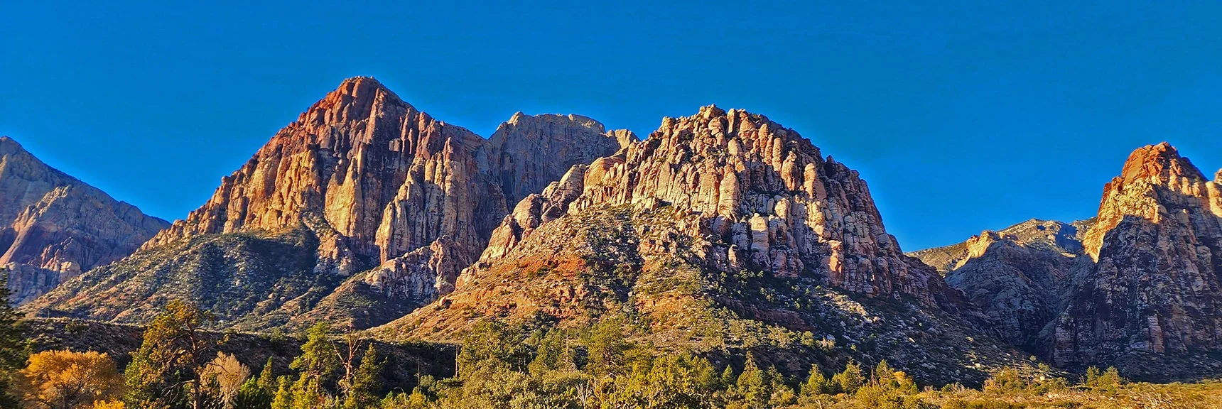 Rainbow Mountain (left), Juniper Peak (right) Juniper Canyon (between) | Rainbow Mountain Eastern Cliffs Rock Climbers | Rainbow Mountain Wilderness, Nevada