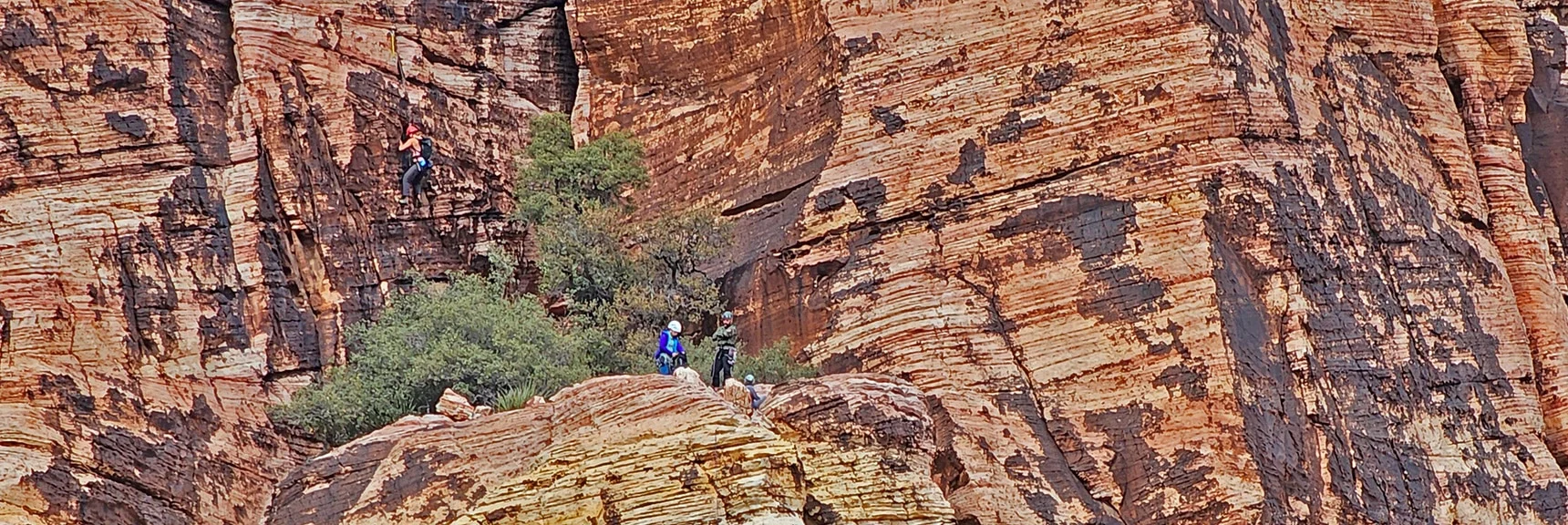 Rock Climbers Resting on a High Ledge on Juniper Peak's Southern Cliffs | Rainbow Mountain Eastern Cliffs Rock Climbers | Rainbow Mountain Wilderness, Nevada