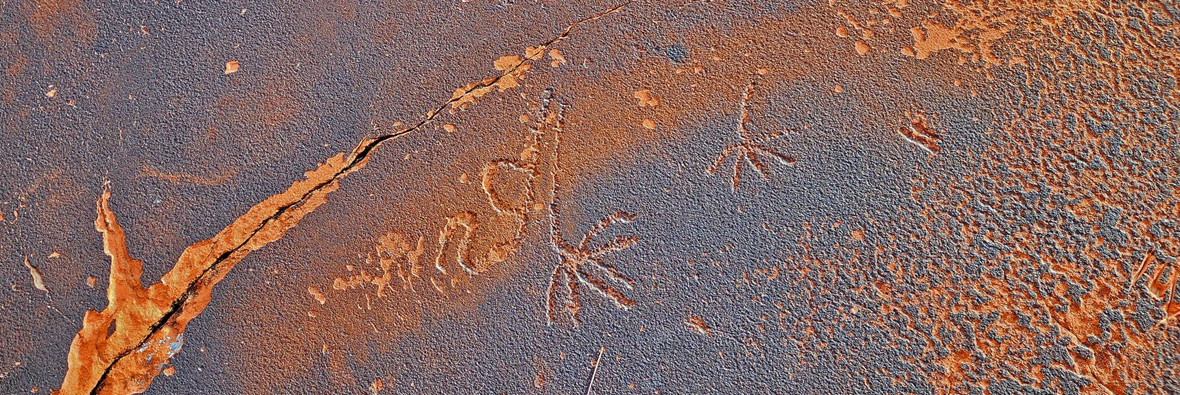 Ancient Petroglyph Drawings Etched into the Sandstone Surface | Grand Circle Loop | Red Rock Canyon National Conservation Area, Nevada