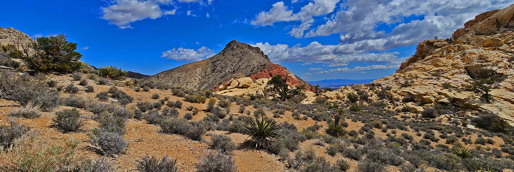 Near Rattlesnake Trail Summit Turn Left at the Peak Ahead To Descend Into Calico Basin. | Ash Canyon to Calico Tanks | Calico Basin and Red Rock Canyon, Nevada | David Smith | Las Vegas Area Trails