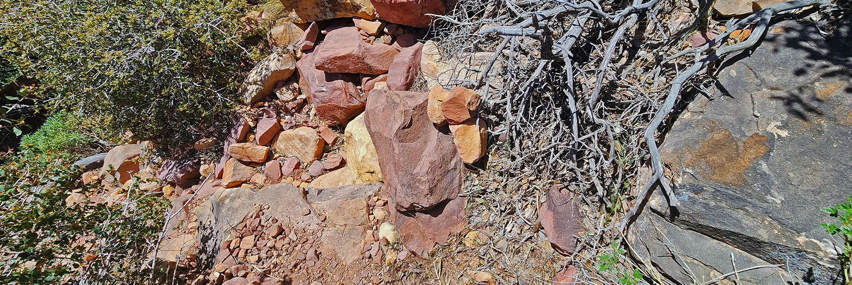 View Down Through Rocky Ascent Passage to Sandstone Slab | Juniper Canyon | Red Rock Canyon National Conservation Area, Nevada | David Smith | LasVegasAreaTrails.com