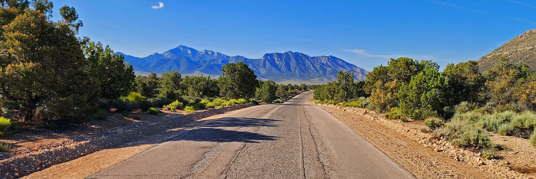 View Back Down Lovell Canyon Road to Potosi Mountain | Juniper Peak to Mt. Wilson | Rainbow Mountains Upper Crest Ridgeline, Nevada