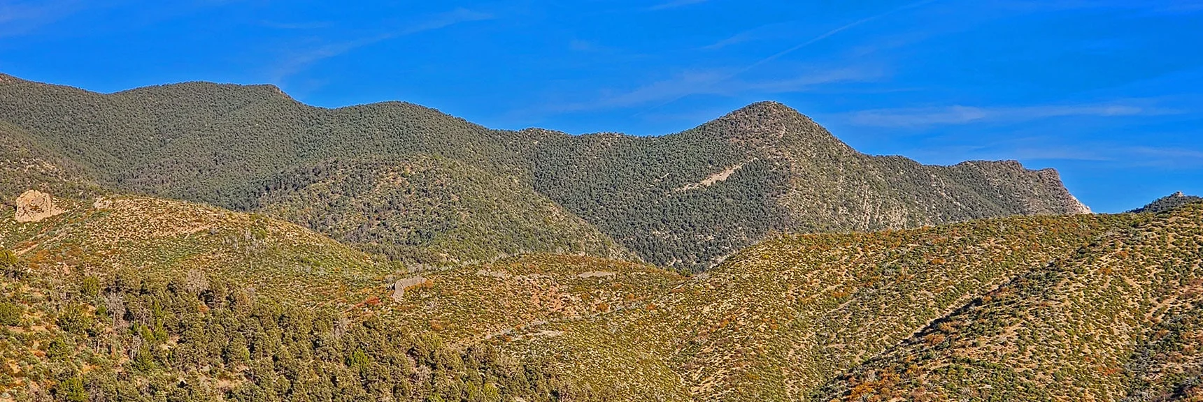 Sharp Drop to Right on Wilson Ridge Marks Beginning of Low Saddle in Ridgeline. | Griffith Shadow Loop | Lovell Canyon, Nevada