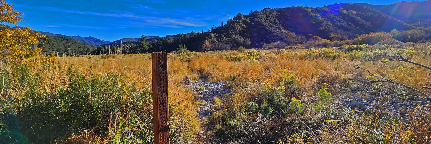 Arrival at Canyon Crossing Point. Note Marker, and That Rocky Ridge Across on West Side | Griffith Shadow Loop | Lovell Canyon, Nevada
