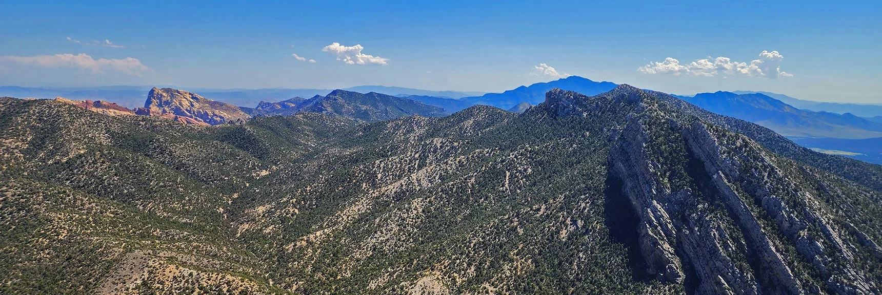 View South Along Wilson Ridgeline to Distant Potosi Mt., South End of Spring Mountains. | Red Rock Summit | Lovell Canyon & Rainbow Mountain Wilderness, Nevada