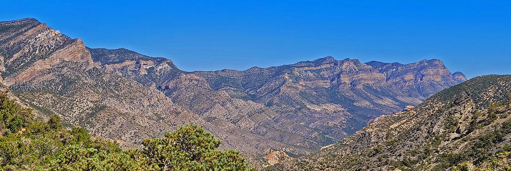 Further to the Right is the La Madre Mts. Cliff Line Above Red Rock Canyon | Rocky Gap Rd to Bridge Mt Trailhead | Lovell Canyon, Nevada