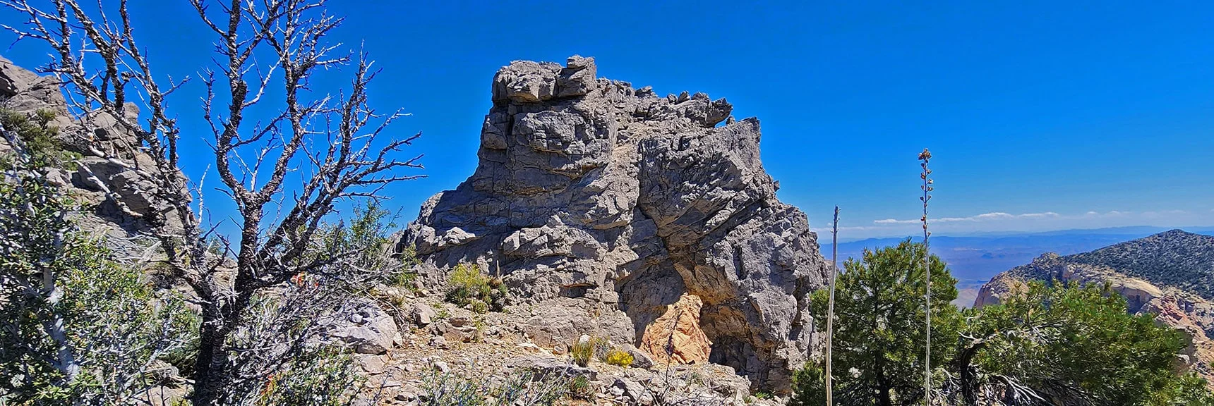 View Mt. Wilson Through This Spectacular Arch Near First Creek Overlook Cliff. | Mt Wilson to Juniper Peak | Rainbow Mountains Upper Crest Ridgeline | Rainbow Mountain Wilderness, Nevada