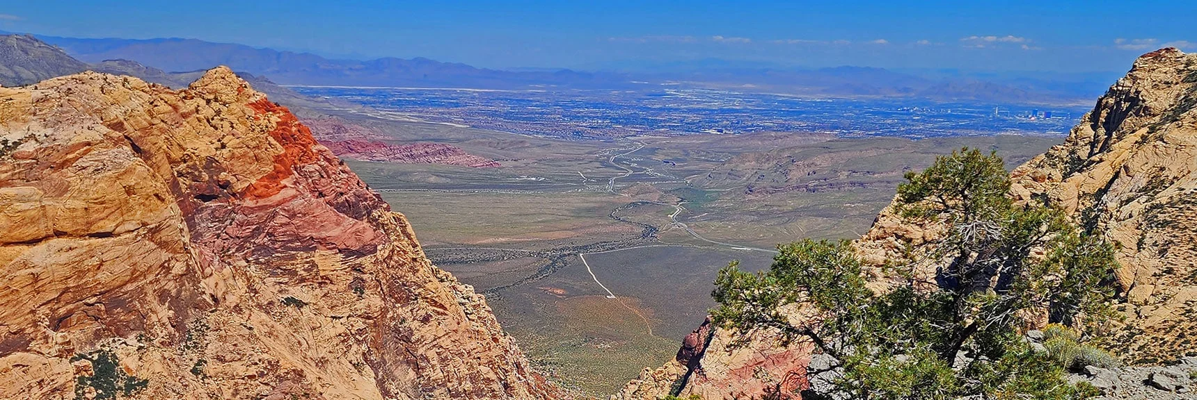Las Vegas Valley Through Oak Creek Canyon Between Rainbow Mt. & Mt. Wilson. | Mt Wilson to Juniper Peak | Rainbow Mountains Upper Crest Ridgeline | Rainbow Mountain Wilderness, Nevada