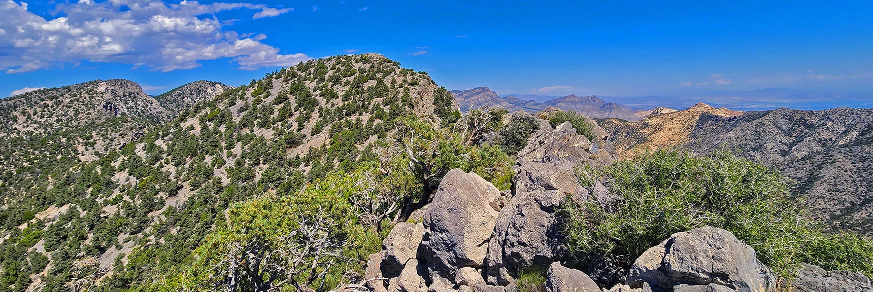 Red Rock Summit from the Rocky Outcrop Towering Above the Bridge Mt. Trailhead. | Red Rock Summit | Lovell Canyon & Rainbow Mountain Wilderness, Nevada