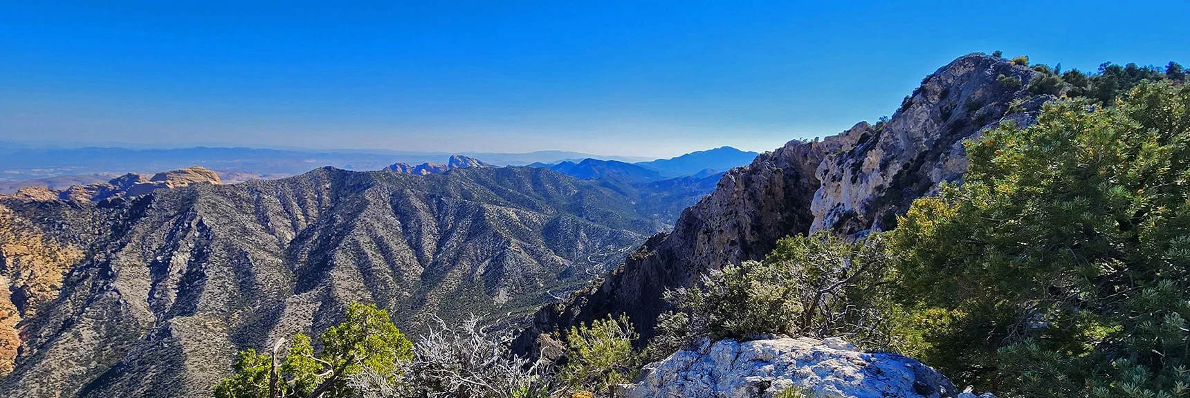 Sandstone Peaks Visible Over Rainbow Mts. Upper Crest Ridgeline Across Rocky Gap Rd Canyon. | Mini Matterhorn Pinnacle North Twin | Wilson Ridge | Lovell Canyon & Rainbow Mountains, Nevada