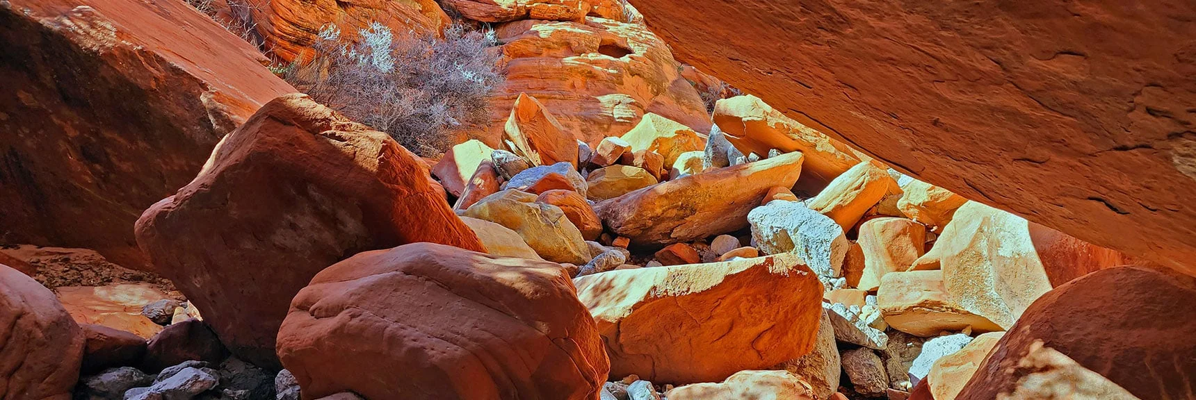 Now Passing Under a Huge Boulder in Canyon Below | Pink Goblin Loop | Calico Basin, Nevada