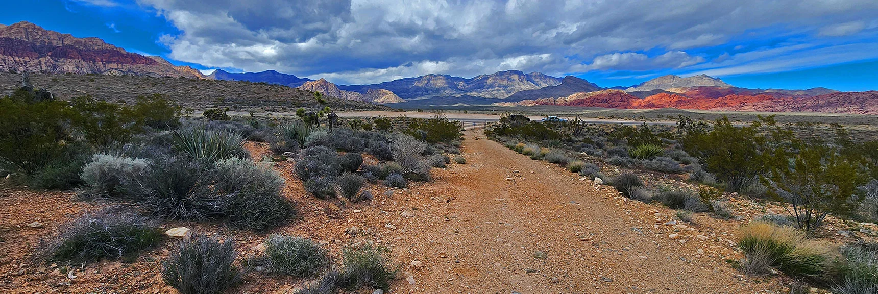Now on Unpaved Road. One of Very Few Passages Through Hwy 159 Long Barrier Fence. | Western High Ridge | Blue Diamond Hill, Nevada