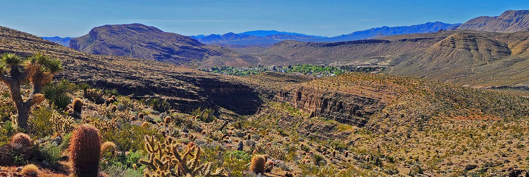 View Down Canyon from Summit Reveals Canyon and Town of Blue Diamond Below. | Blue Diamond Hill Southern Triangle | Red Rock Canyon National Conservation Area, Nevada