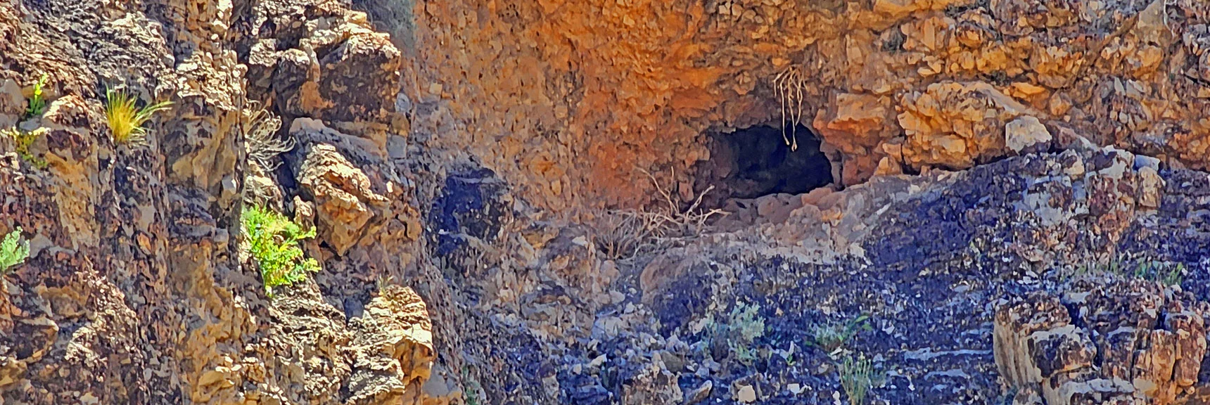 This Cave in Vertical Cliff Walls Looks Deep. | Blue Diamond Hill Southern Triangle | Red Rock Canyon National Conservation Area, Nevada