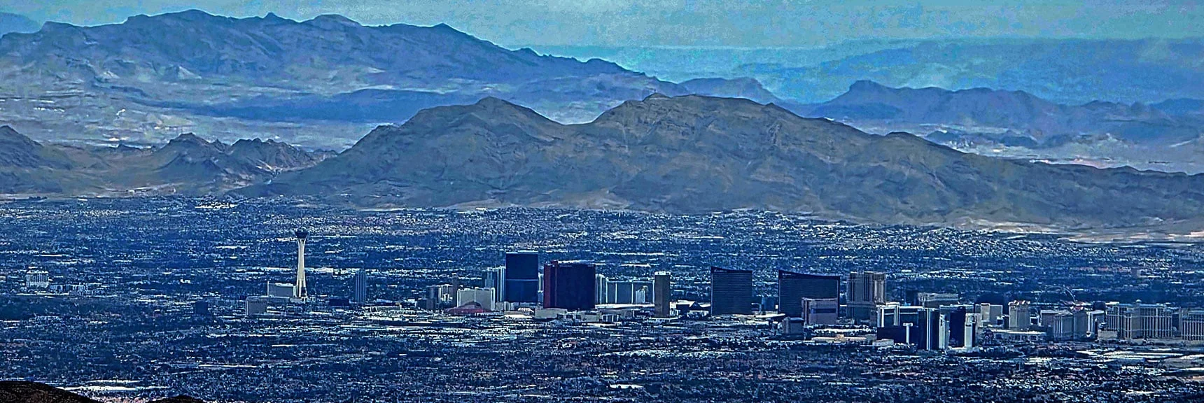 East: Vegas Strip, Frenchman Mt. & Muddy Mts. Background. | Monument Peak Summit | Rainbow Mountain Wilderness, Nevada