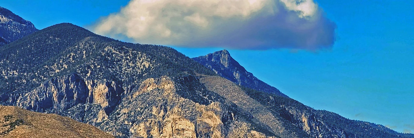 Mummy Mountain's Head (Pointed Peak). Fletcher Peak to Left. | La Madre Ridgeline Grand Crossing | La Madre Mountains Wilderness and Red Rock Canyon NCA, Nevada
