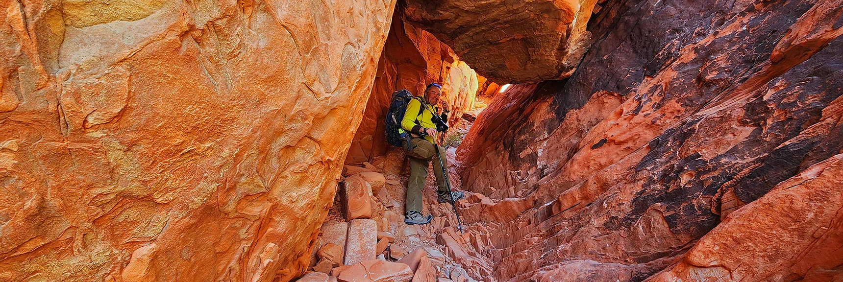 Pass Under a Rabbit Hole Half Way Up the Ascent Gully | Calico Tanks from Guardian Angel Pass | Red Rock Canyon NCA, Nevada