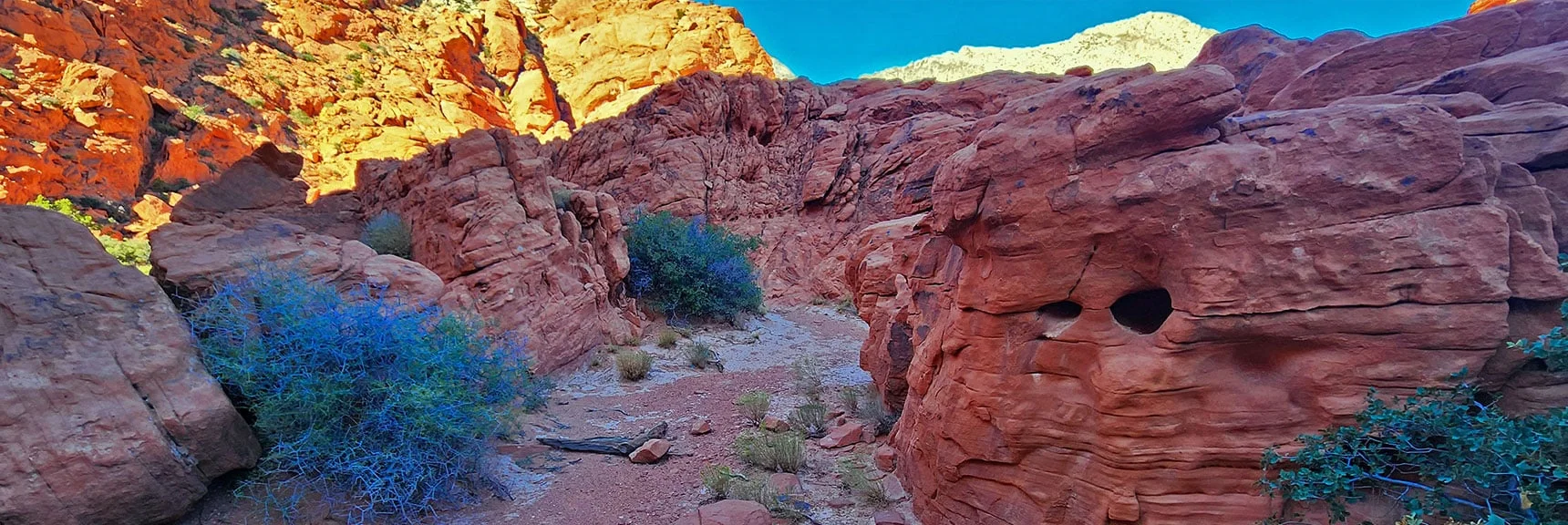Continuing Through Restful Channel Surrounded by Sandstone Sculptures | Calico Tanks from Guardian Angel Pass | Red Rock Canyon NCA, Nevada