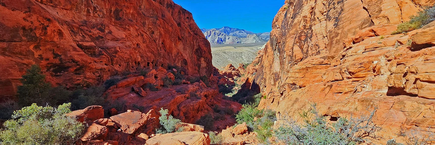 View Toward Red Rock Canyon from Guardian Angel Pass Summit Stone. | Calico Tanks from Guardian Angel Pass | Red Rock Canyon NCA, Nevada