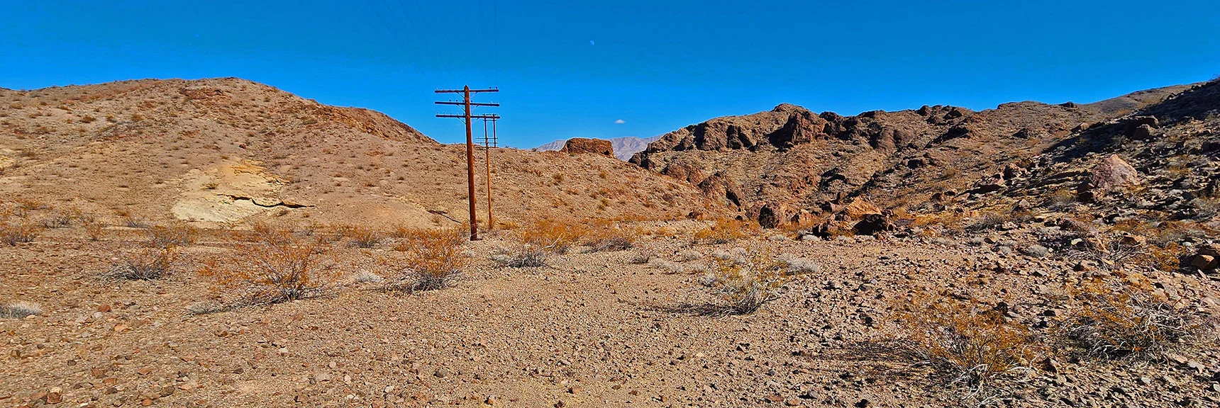 Goldstrike Canyon is Just Over Ridge to Left of Powerlines. | Black Canyon Overlook Loop | Lake Mead NRA, Nevada