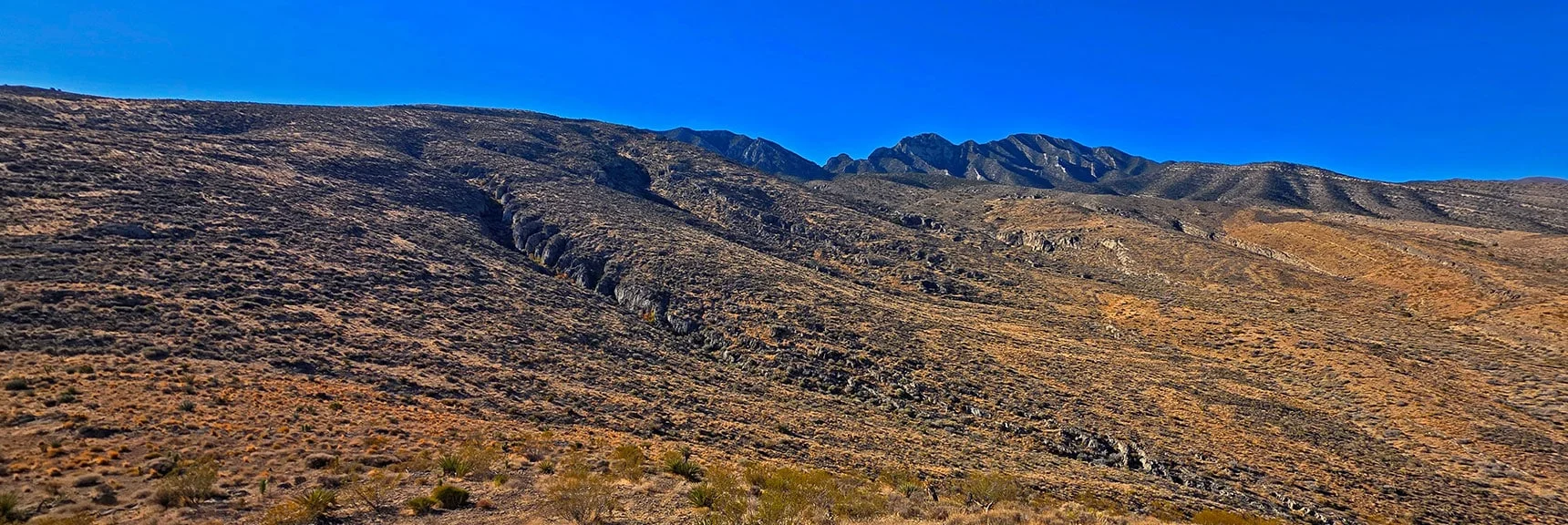 Leave Road, Begin Ascending Approach Ridges. La Madre Ridgeline Visible to Right. | East La Madre Peak | La Madre Mountains Wilderness, Nevada