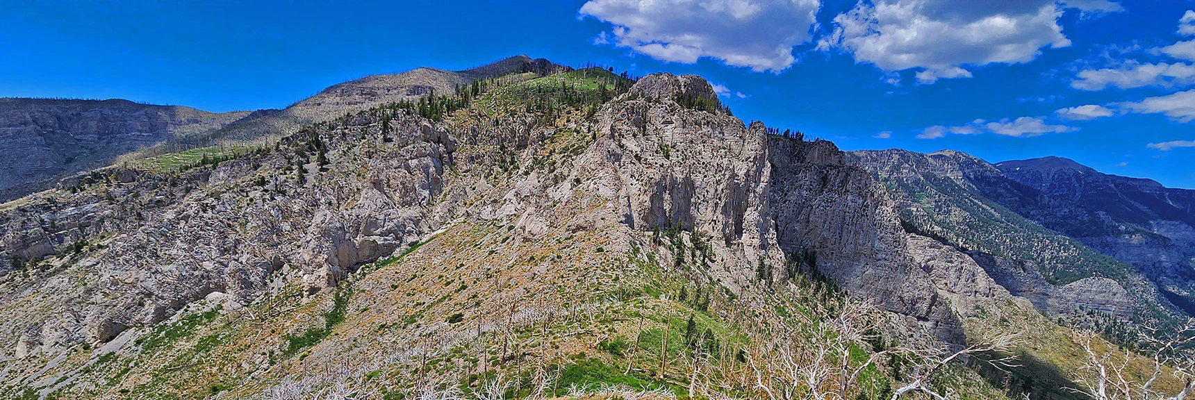 Blue Diamond Hill (R), Red Rock Canyon (Middle), Indecision Peak (L). | Monument Peak Summit | Rainbow Mountain Wilderness, Nevada