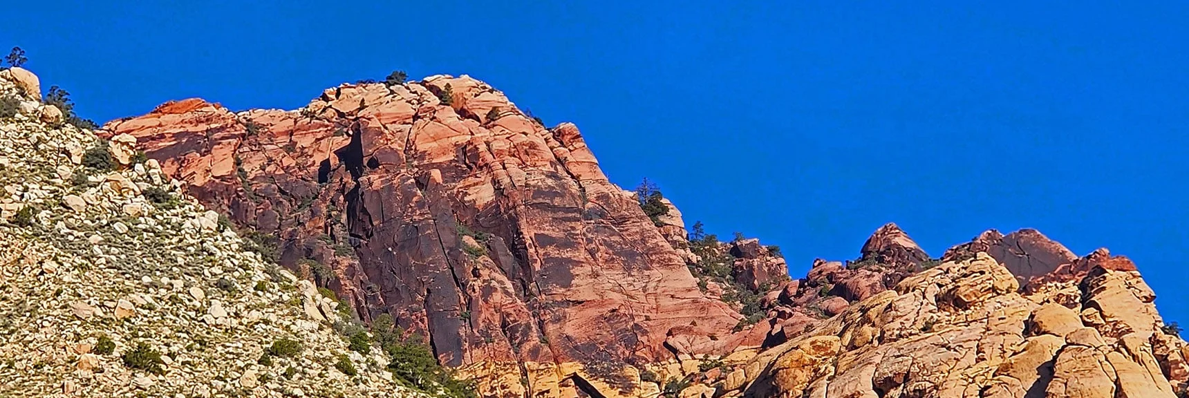 Blue Diamond Hill (R), Red Rock Canyon (Middle), Indecision Peak (L). | Monument Peak Summit | Rainbow Mountain Wilderness, Nevada